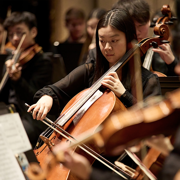PYP musicians playing the cello